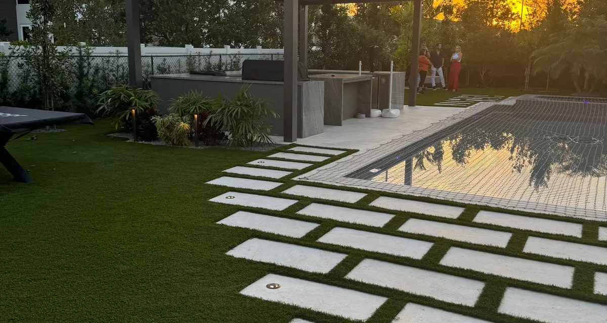 Artificial grass backyard at sunset installed by Govorex